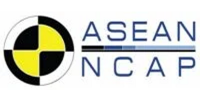 The ASEAN NCAP logo. It features a circular yellow and black symbol resembling a target crosshair to the left of the text "ASEAN NCAP". The text is in blue, with a horizontal line beneath "ASEAN" that has a color gradient from dark blue to light blue.